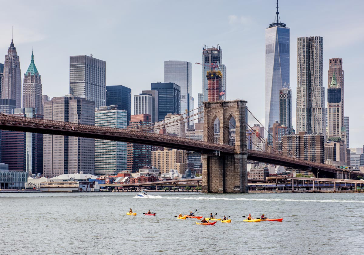 A group of people kayaking in New York City