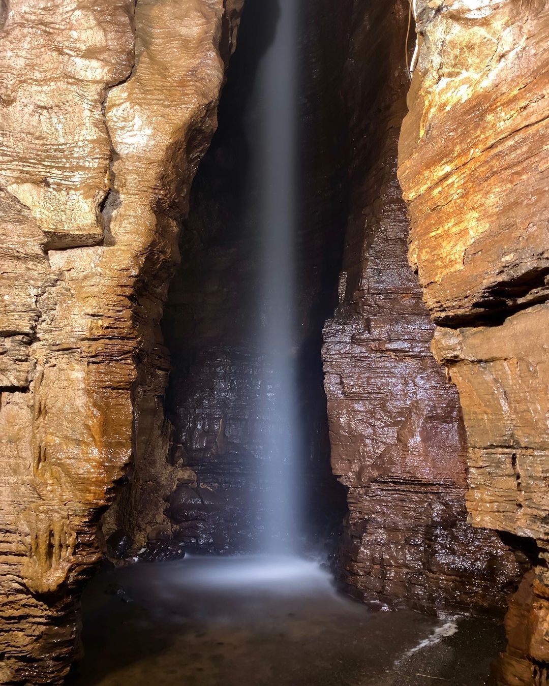 The underground waterfall in Secret Caverns