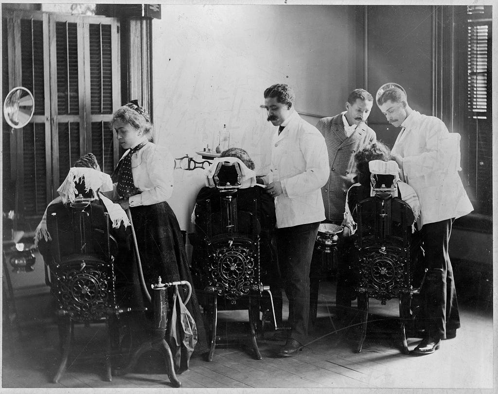 Dentistry students practice at Howard University in Washington, D.C., in 1900.