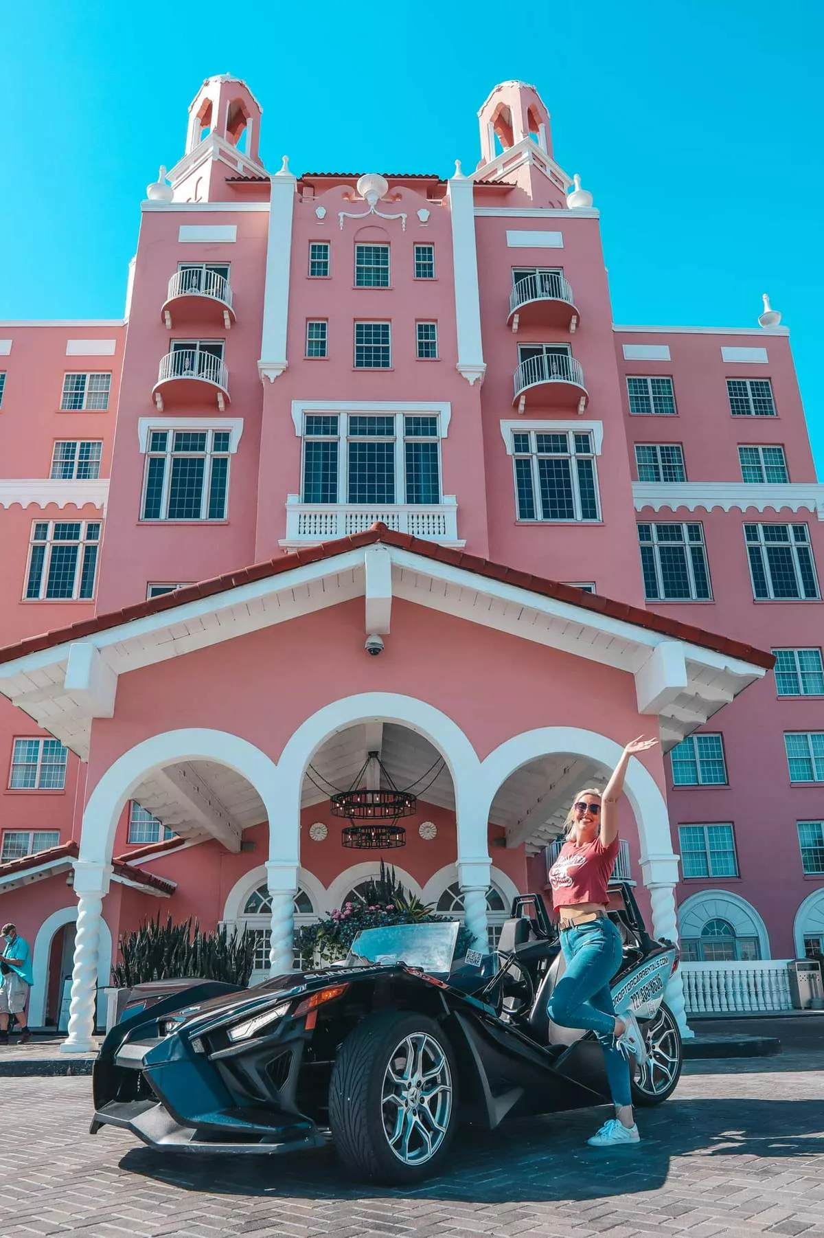 Scoot Scoot Rental Polaris Slingshot in front of the Don Cesar in St. Pete Beach