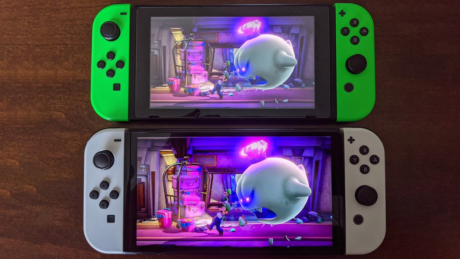 Nintendo Switch Oled Model Next To Switch V2 Luigis Mansion 3 With King Boo
