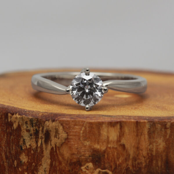 Ethical platinum twisted prong solitaire ring