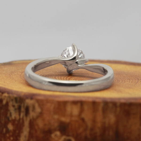 Handmade platinum twisted prong solitaire ring