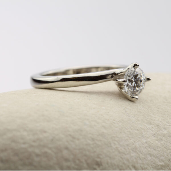Eco platinum twisted prong solitaire ring