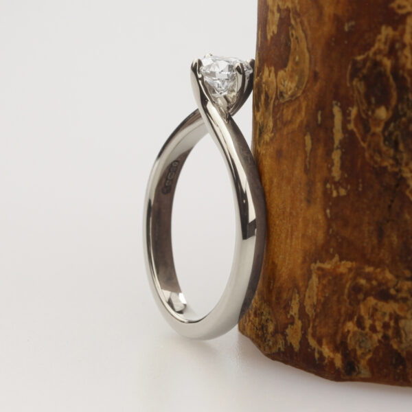 Bespoke platinum twisted prong solitaire ring