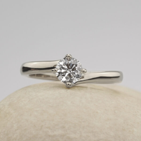 Custom platinum twisted prong solitaire ring
