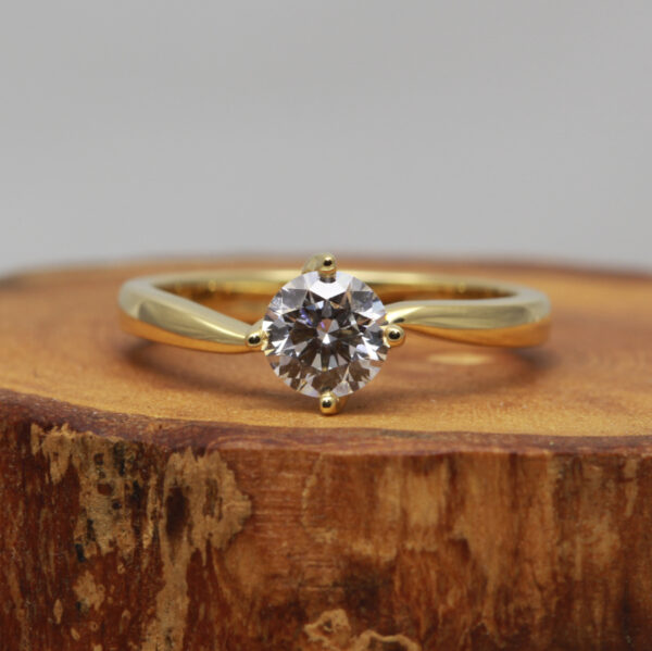 Handmade 18ct gold twisted prong solitaire ring