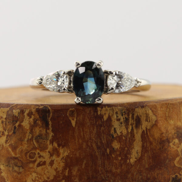 Sustainable Teal Sapphire Trilogy Engagement Ring