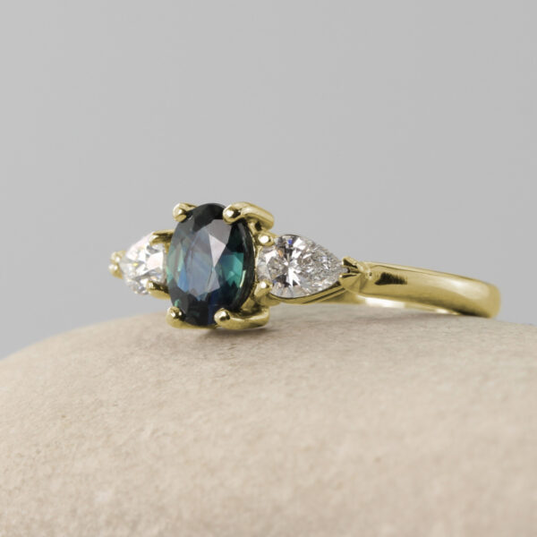 Hand Crafted 18ct Gold Teal Sapphire Trilogy Engagement Ring