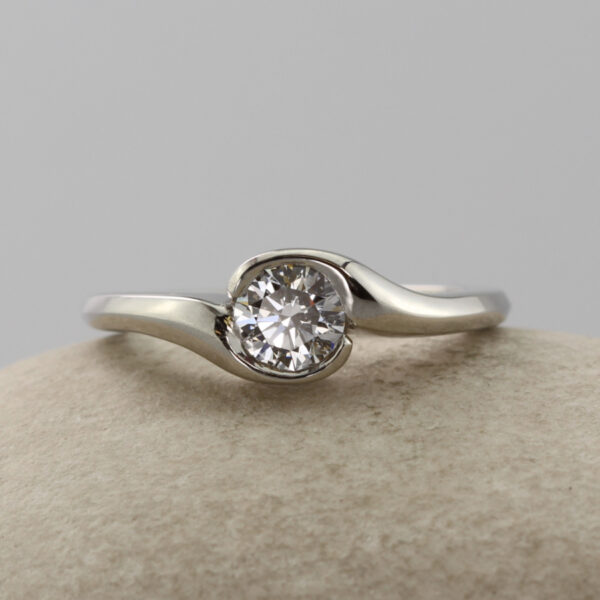 Handmade Platinum Diamond Solitaire Crossover Engagement Ring