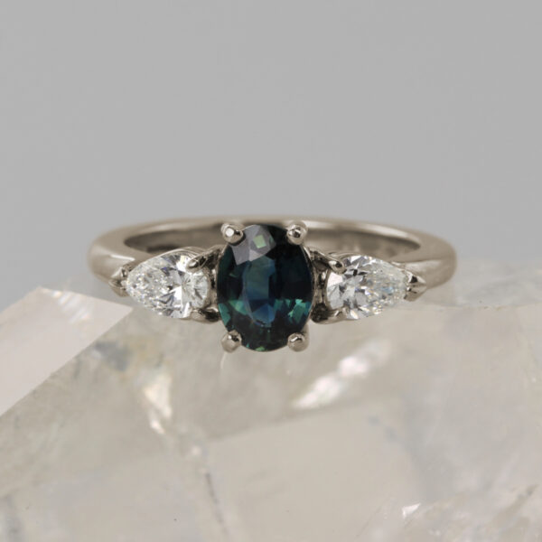 Bespoke 18ct White Gold Teal Sapphire Trilogy Engagement Ring