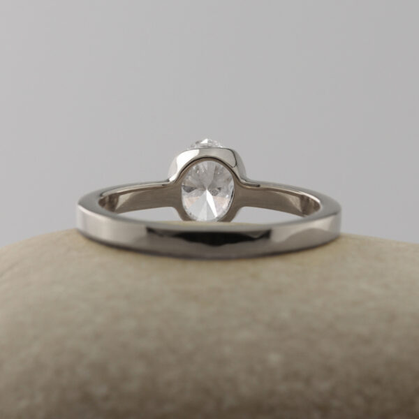 Unique Platinum Oval Solitaire Engagement Ring