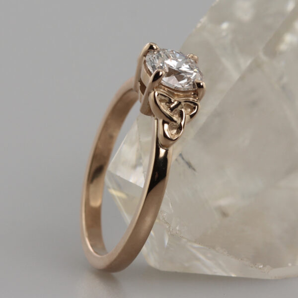 Eco rose gold and Celtic knot engagement ring