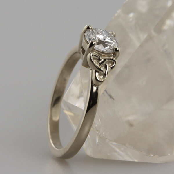 Unique white gold and Celtic knot engagement ring