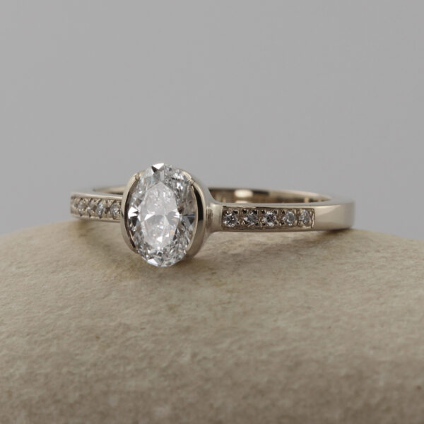 Eco 18ct White Gold Oval Solitaire Engagement Ring with Pave Shoulders