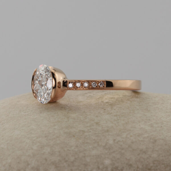 Custom 18ct Rose Gold Oval Solitaire Engagement Ring with Pave Shoulders