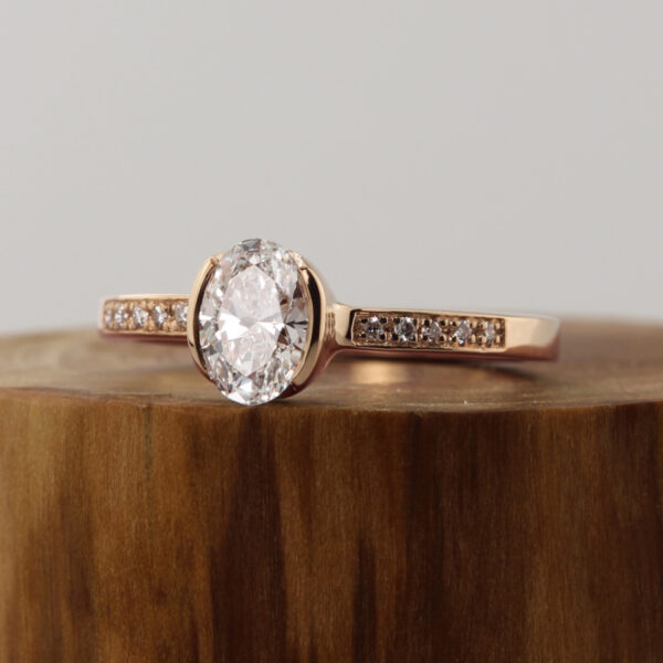 Unique 18ct Rose Gold Oval Solitaire Engagement Ring with Pave Shoulders