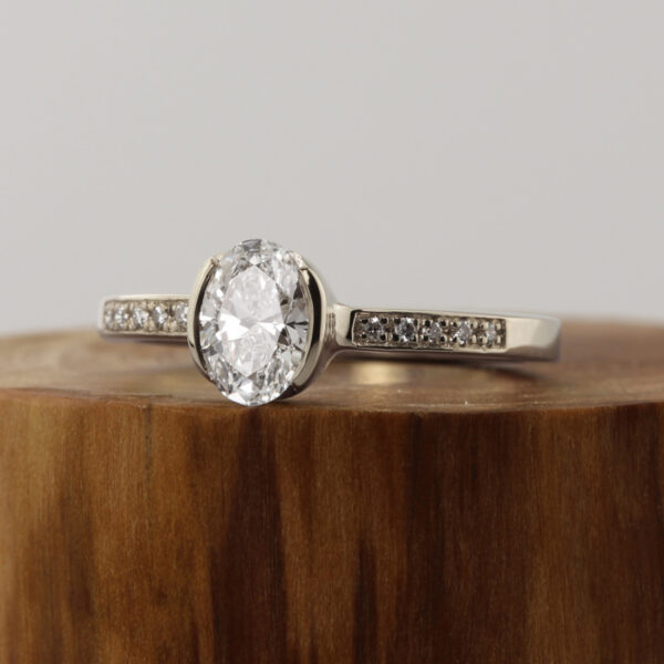 Bespoke 18ct White Gold Oval Solitaire Engagement Ring with Pave Shoulders