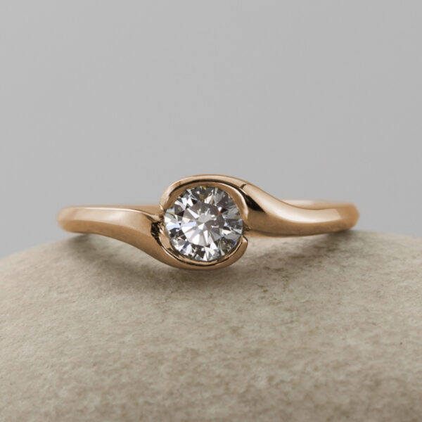 Recycled 18ct Rose Gold Diamond Solitaire Crossover Engagement Ring