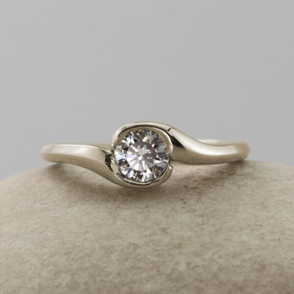 Recycled 18ct White Gold Diamond Solitaire Crossover Engagement Ring