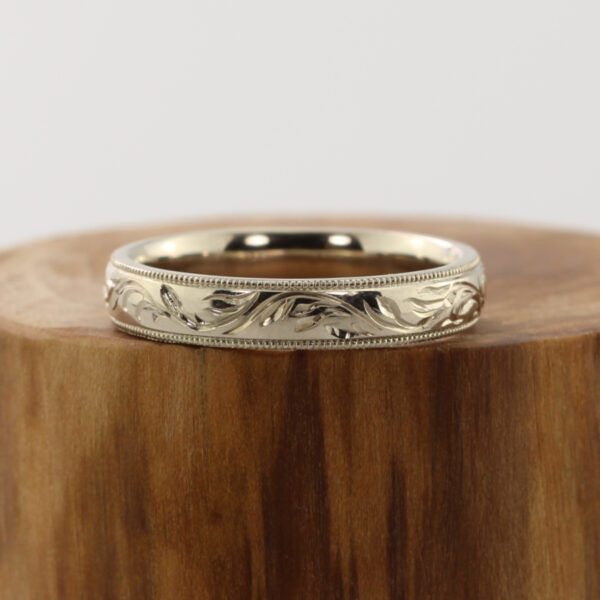 Ethical hand engraved forest canopy white gold ring