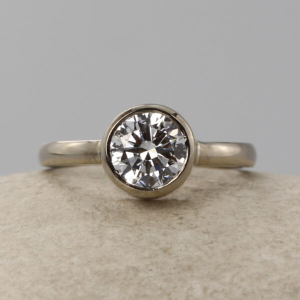Independent Bezel Set White Gold Diamond Engagement Ring