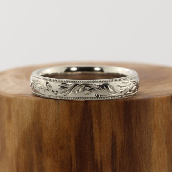 Ethical hand engraved forest canopy 950 Platinum ring