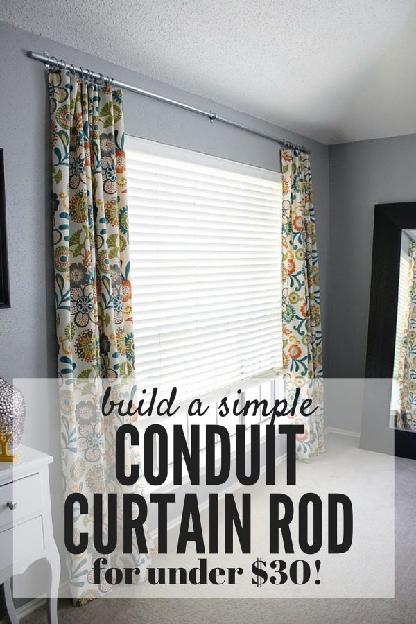 large window with DIY conduit curtain rod 