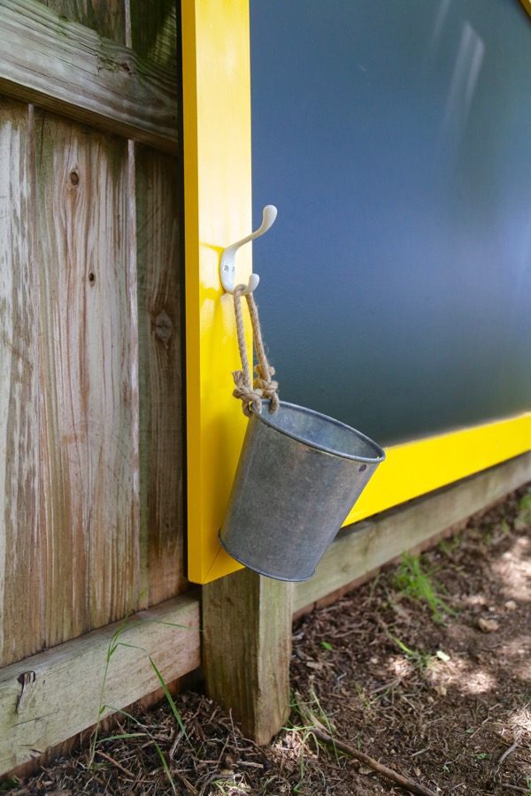 closet up of hook and bucket to hold chalk