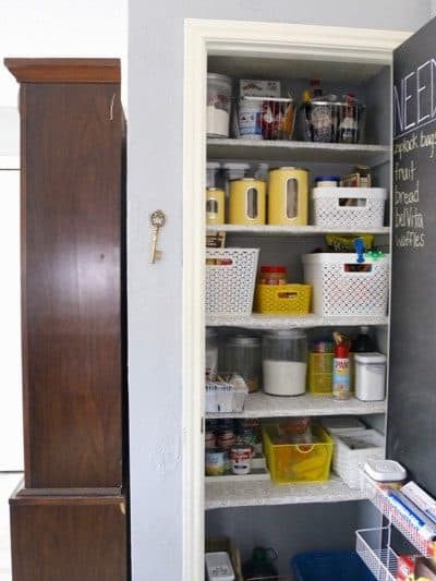 This pantry makeover is so gorgeous, and SO simple! It's easy to feel like you have to spend a ton of money to get an organized pantry, but this blogger got creative and spent just over $100 to totally upgrade her whole pantry!