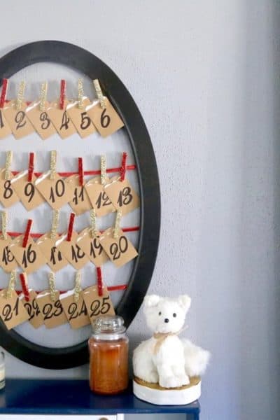 This DIY activity advent calendar is a great Christmas tradition. Tons of great ideas for activities to do with your family this Christmas, and it's so simple to make yourself!