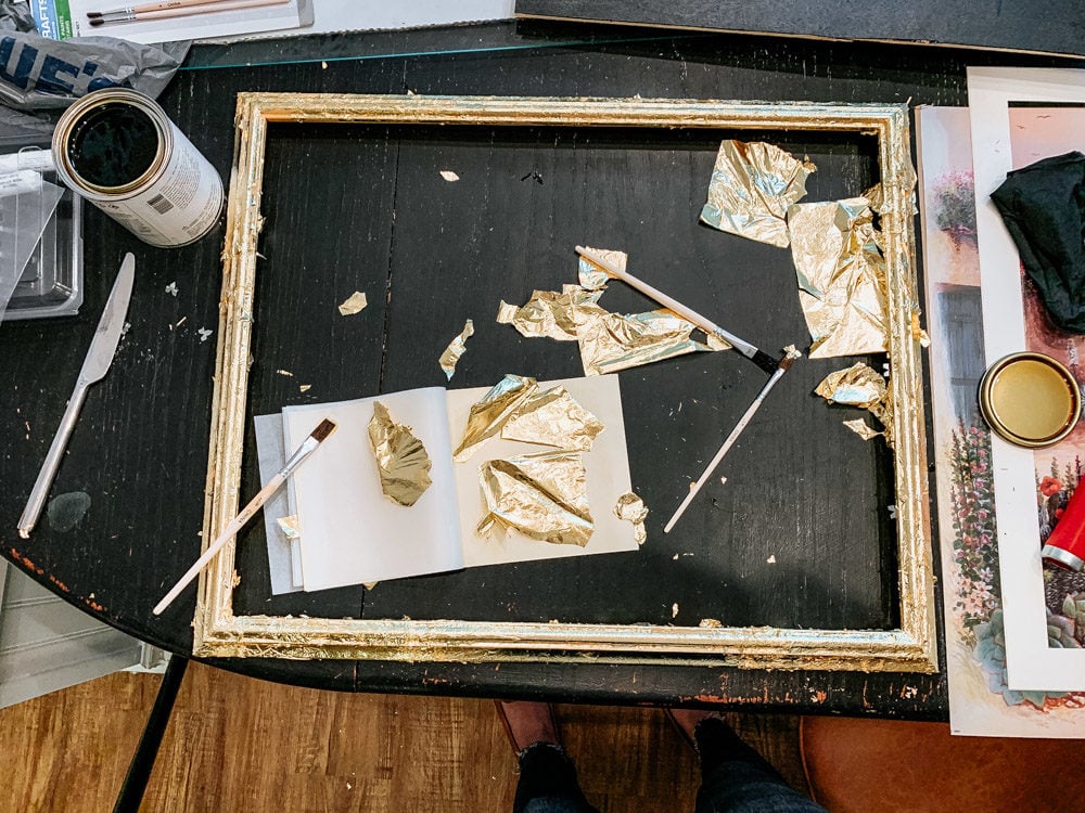 Frame with gold leaf being applied