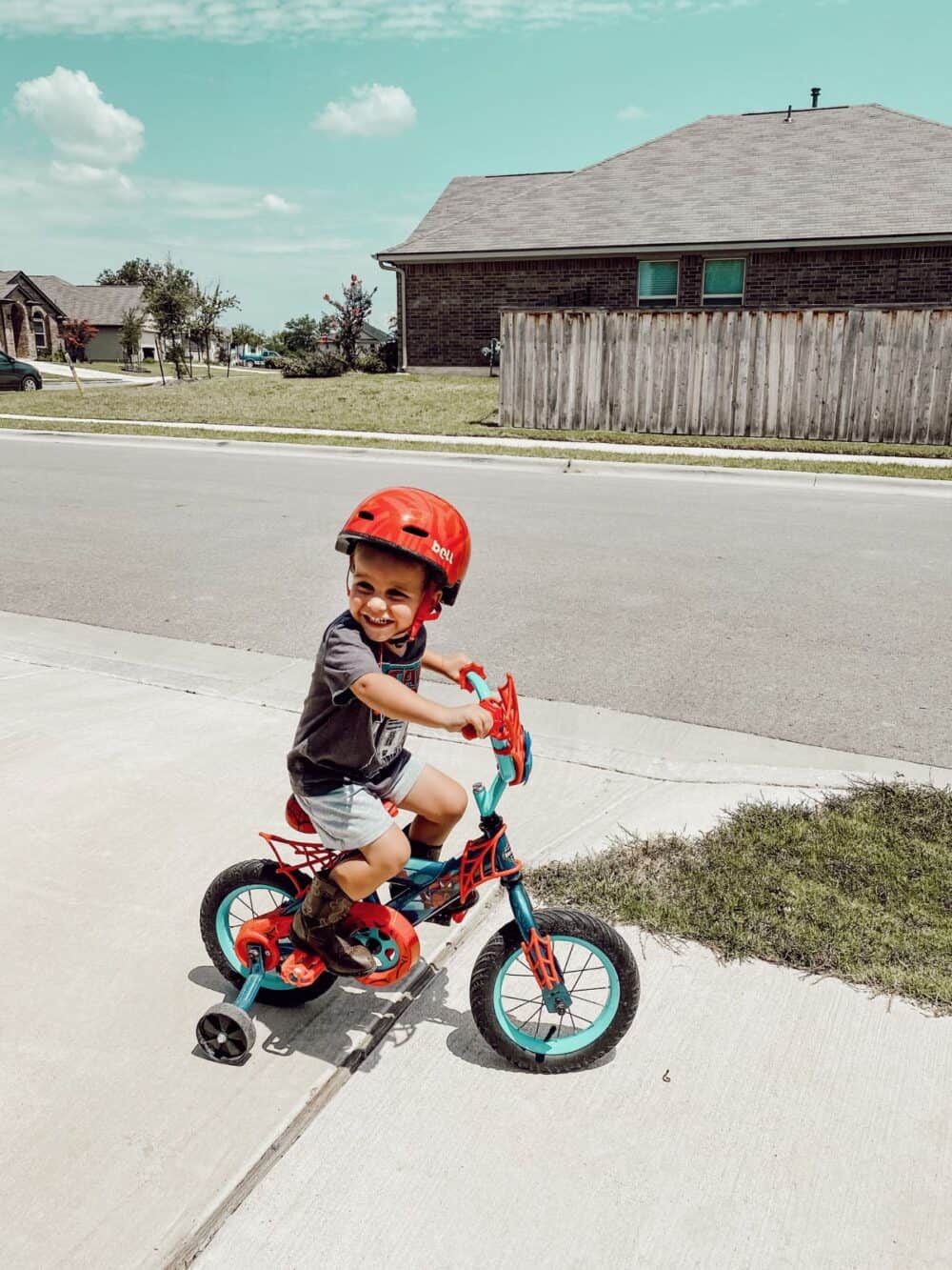 toddler riding a tricycle