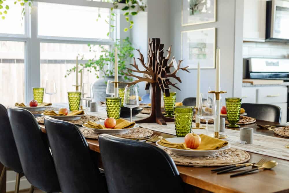 dining room table set with a Thanksgiving aesthetic