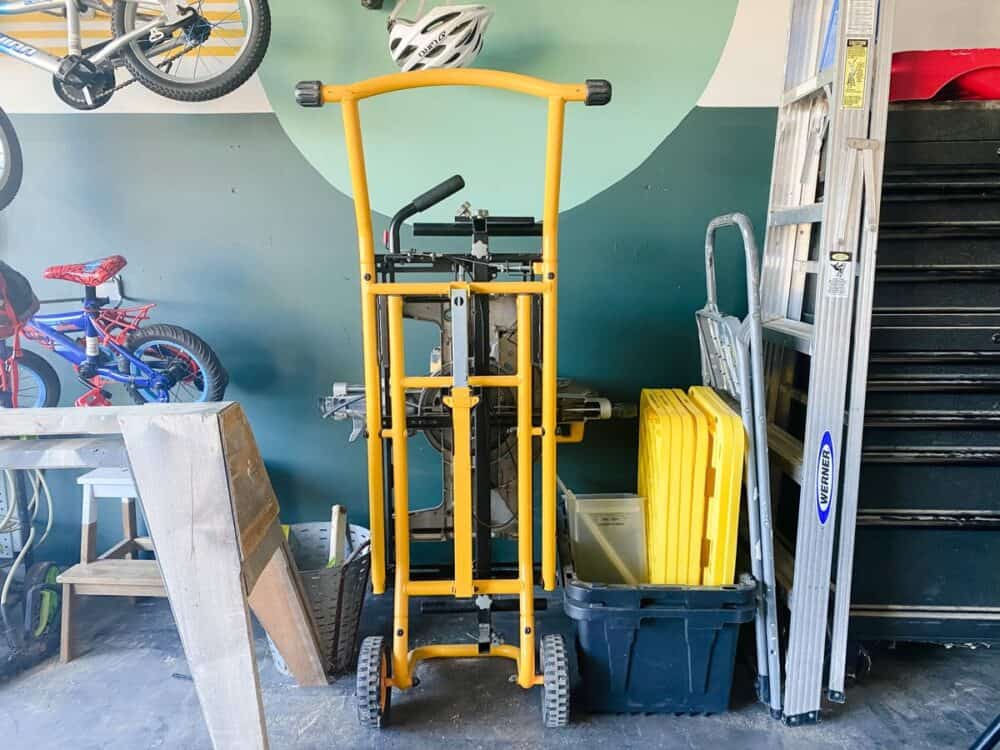 yellow mobile miter saw stand 