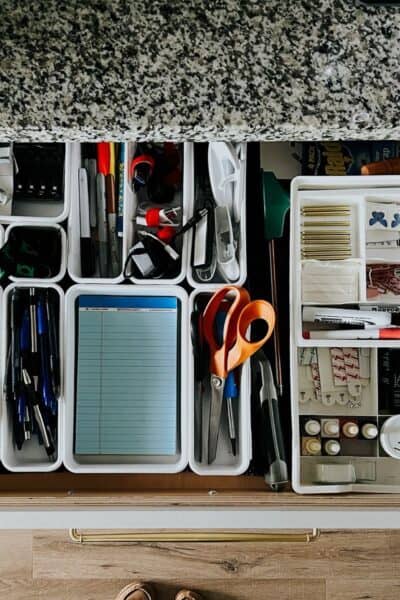 overhead view of an organized junk drawer