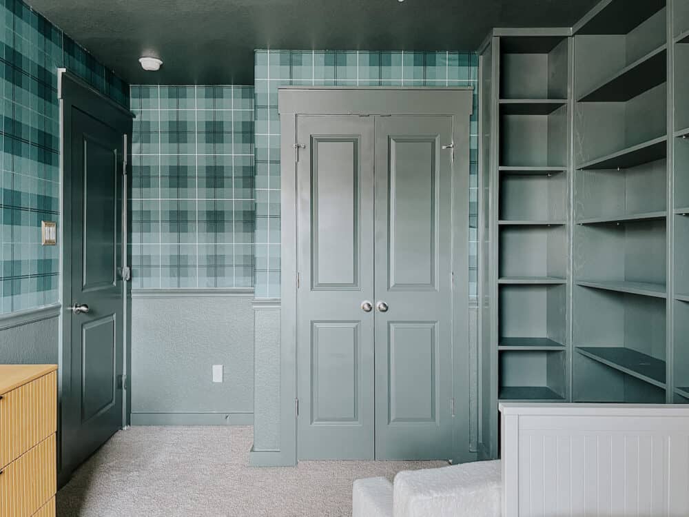 Boys' room with green plaid wallpaper