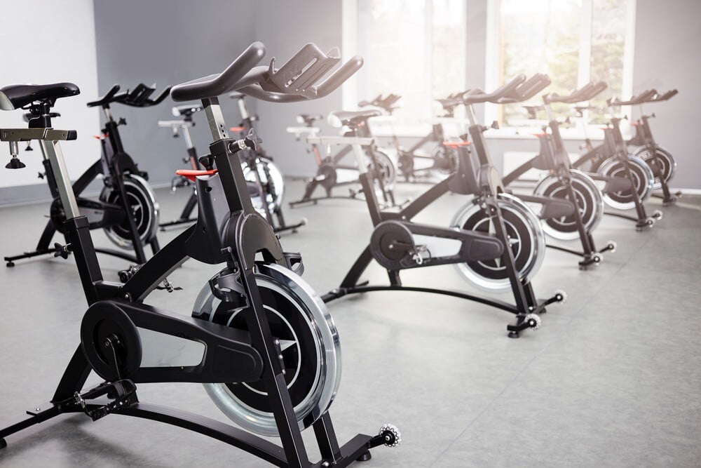 How can I make my bicycle a stationary bike to exercise on indoors?