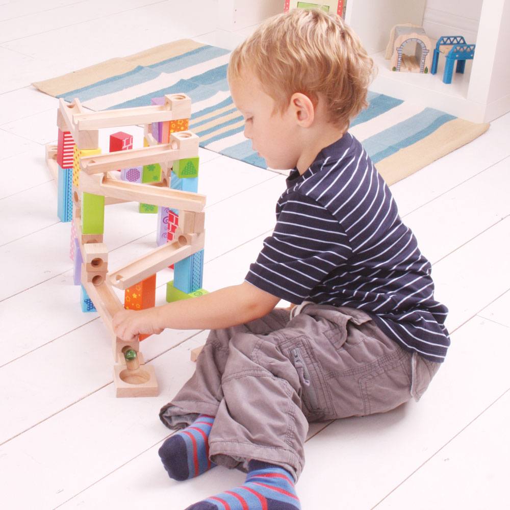 instructured play with stacking blocks marble run