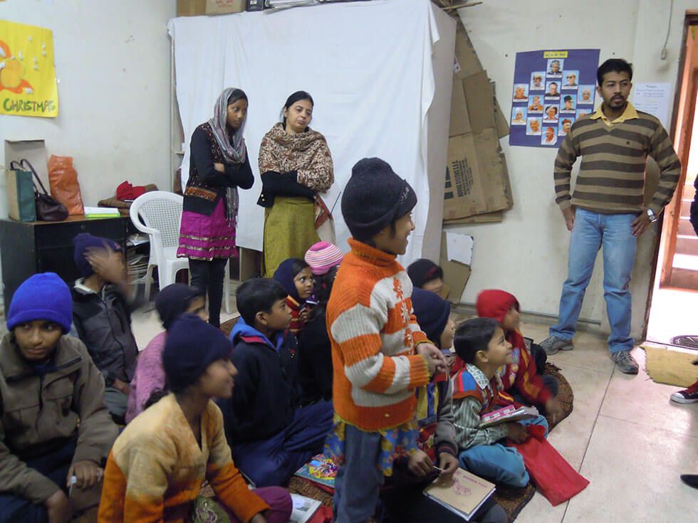 children sitting image, Initiative for social cause undertaken by businessman