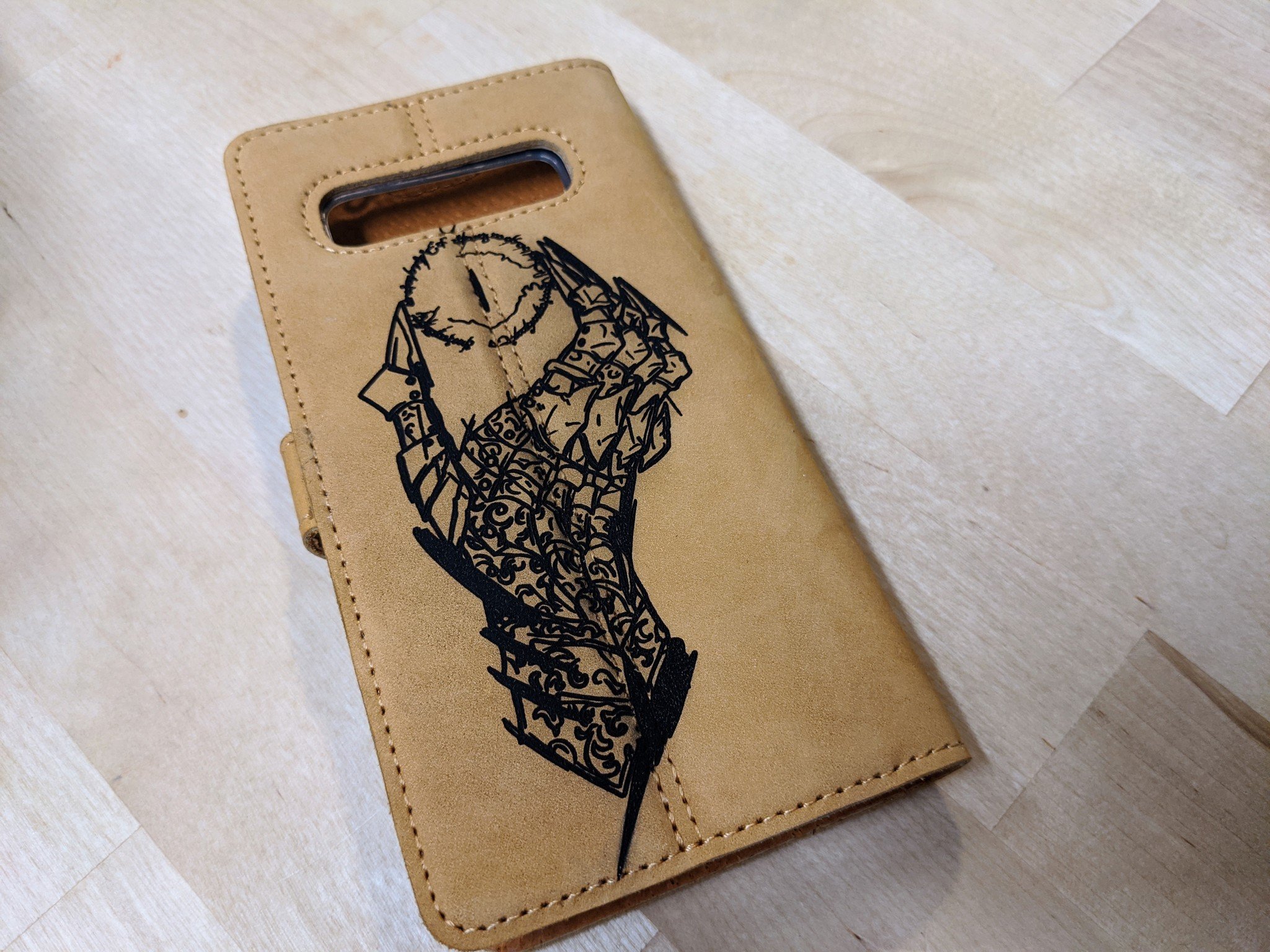 Leather case with Sauron hand