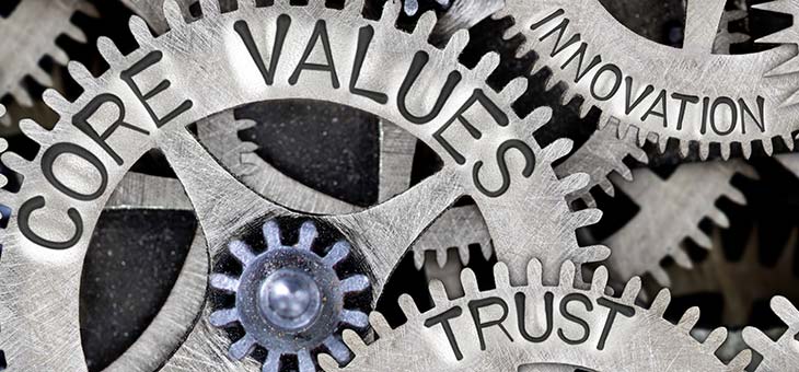 cogs and gear displaying the words core values, trust and innovation