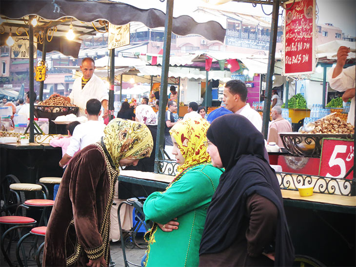 women standing in a marrakesh market